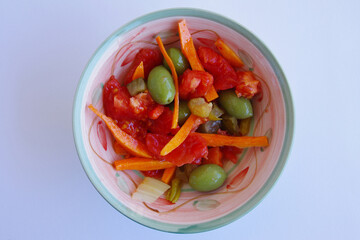 Mixed salad with olives, carrots, tomatoes, celery, oil ...