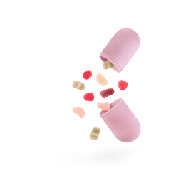 Colorful jelly candies with vitamins and minerals fall out from an open pastel pink violet capsule isolated on white background. Minimalist supplement health care arrangement.