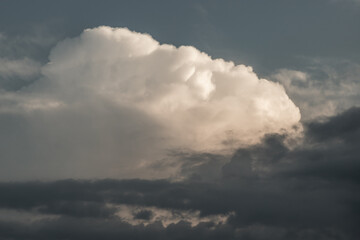 Obraz premium The cloudy beautiful sky with the light shining from the sun. The softness of the cloud creates a feeling of relaxation. Copy space, No focus, specifically.