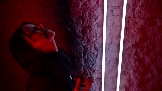 art performance demon possession in a girl thick blood flows from the mouth