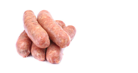 Raw pork sausages.Grilled sausages in close-up, isolated on a white background.Selective focus.