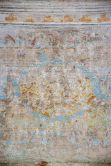 the remains of a painting inside an abandoned church
