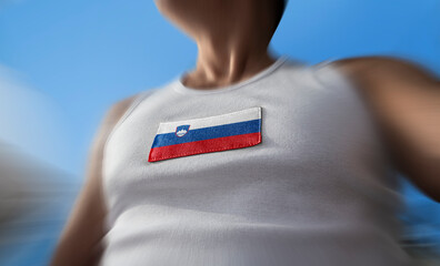 The national flag of Slovenia on the athlete's chest