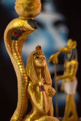 Egyptian statuettes anubis cleopatra and snake