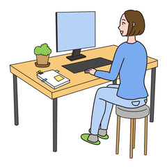 デスクでパソコン作業をしている女性