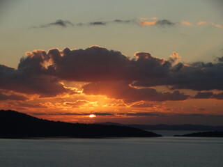 Tropical Sunset With Fire Red Yellow Orange Colors And Cloudy Sky