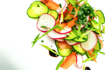 Healthy salad with tomatoes, cucumbers, onions and radishes in Minsk. Healthy snack concept. Keto, a paleo-eater. Top view, overhead, copy space