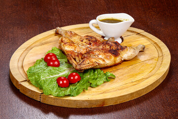 Roasted small chicken with sauce