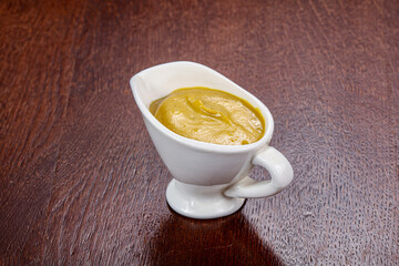 Traditional mustard sauce in the bowl