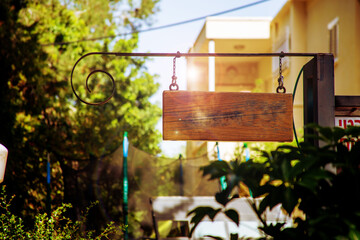 old wooden sign at the country road