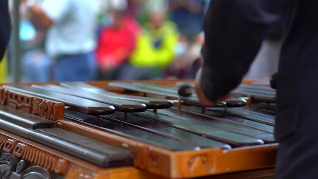 Close up playing marimba. Gautemalan marimba
