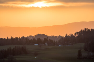 warm sunset light in the hills of Emmental