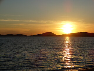 Tropical Sunset With Fire Red Yellow Orange Colors And Cloudy Sky