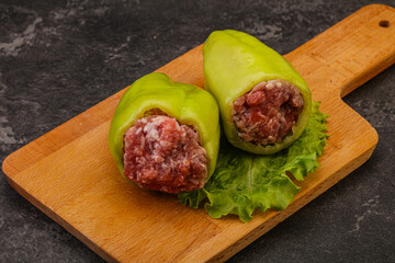Raw stuffed bell pepper with meat
