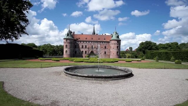 Europe medieval beautiful castle and round fountain