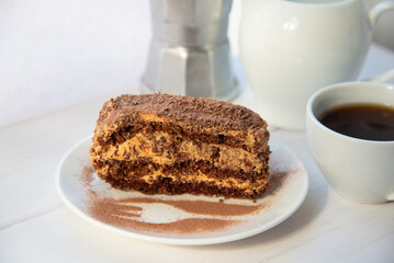 Chocolate cake on the white plate