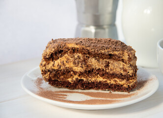 Chocolate cake on the white plate
