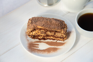 Chocolate cake on the white plate