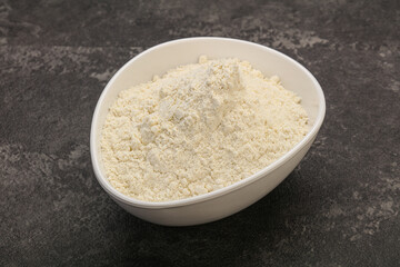 Wheat flour heap in the bowl