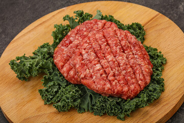 Raw beef burger cutlet for cooking