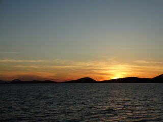 Tropical Sunset With Fire Red Yellow Orange Colors And Cloudy Sky