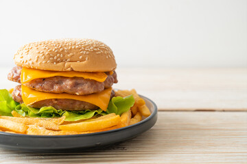 pork burger with cheese and french fries