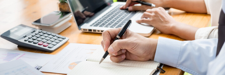 Fototapeta premium Man Analysis Business Accounting working with&nbsp;Individual income tax return.Accounting concept.