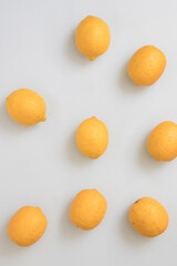 Fresh and natural lemons on white background