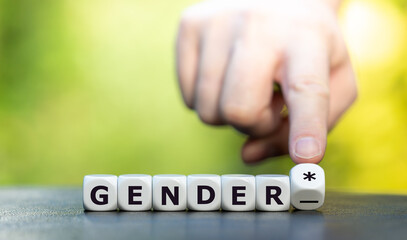 Symbol für eine gendergerechte Sprache. Würfel bilden den Ausdruck 