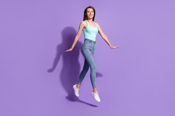 Fototapeta na wymiar Photo of charming happy attractive walk empty space travel good mood isolated on violet color background