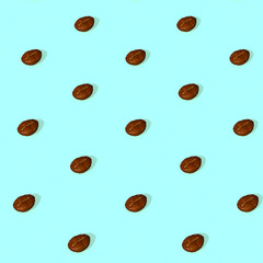 Coffee beans array on blue background, 3D rendering