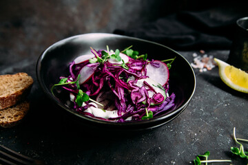 Purple cabbage salad with radish and cucumber