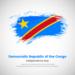 Independence day of Democratic Republic of the Congo. Abstract creative painted grunge brush flag background.