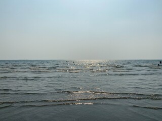 Fototapeta premium sun setting over the sea