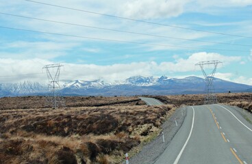 the country road with view of snow mountains