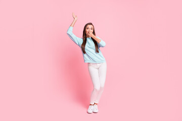 Fototapeta na wymiar Full length portrait of positive playful person arm hold nose breath dance isolated on pink color background