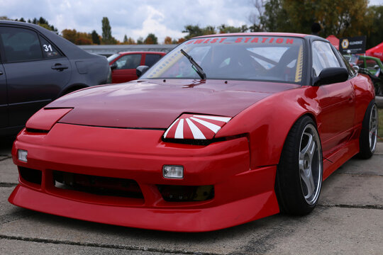 Japanese red sports car, Nissan 180sx. Front view.