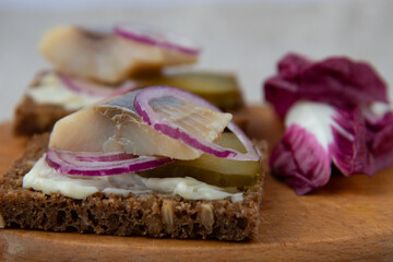 Sandwiches of rye bread with herring