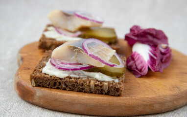 Sandwiches of rye bread with herring