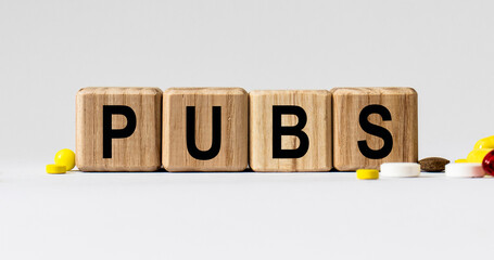 cubes with the word PUBS on them. Care concept.