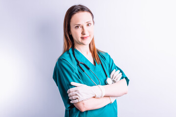 Portrait of hospital doctor with stethoscope gloves looking straight ahead.medicine concept