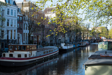 Fototapeta na wymiar beautiful canal houses and bridges in Amsterdam