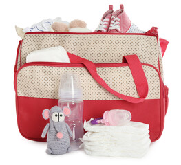 Mother's bag with baby's stuff isolated on white