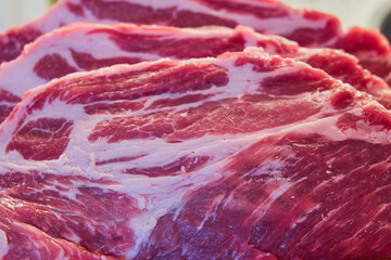 The structure of red pork meat close-up.
