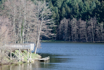 wooden pier by the lake - 427902541
