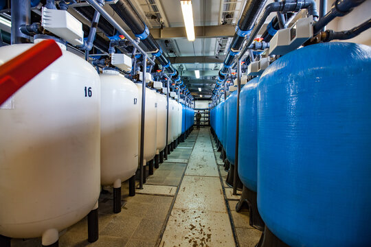 Shchuchinsk city, Kazakhstan - April 20, 2012: Modern water purification and filtration station. Machine room. Tanks and pipes.