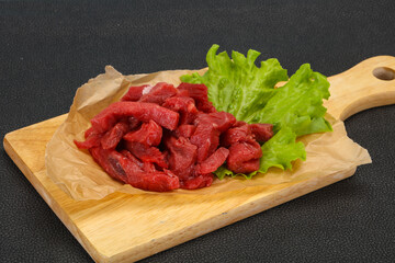 Raw beef meat sliced for cooking
