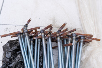 Embedment for concreting from reinforcement welded to a threaded rod