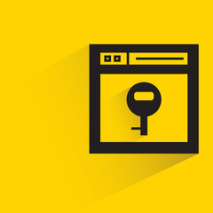 web and key with shadow on yellow background
