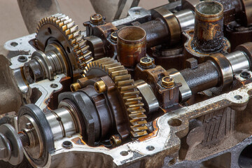 camshaft gears on the head of the car engine. Car engine repair.